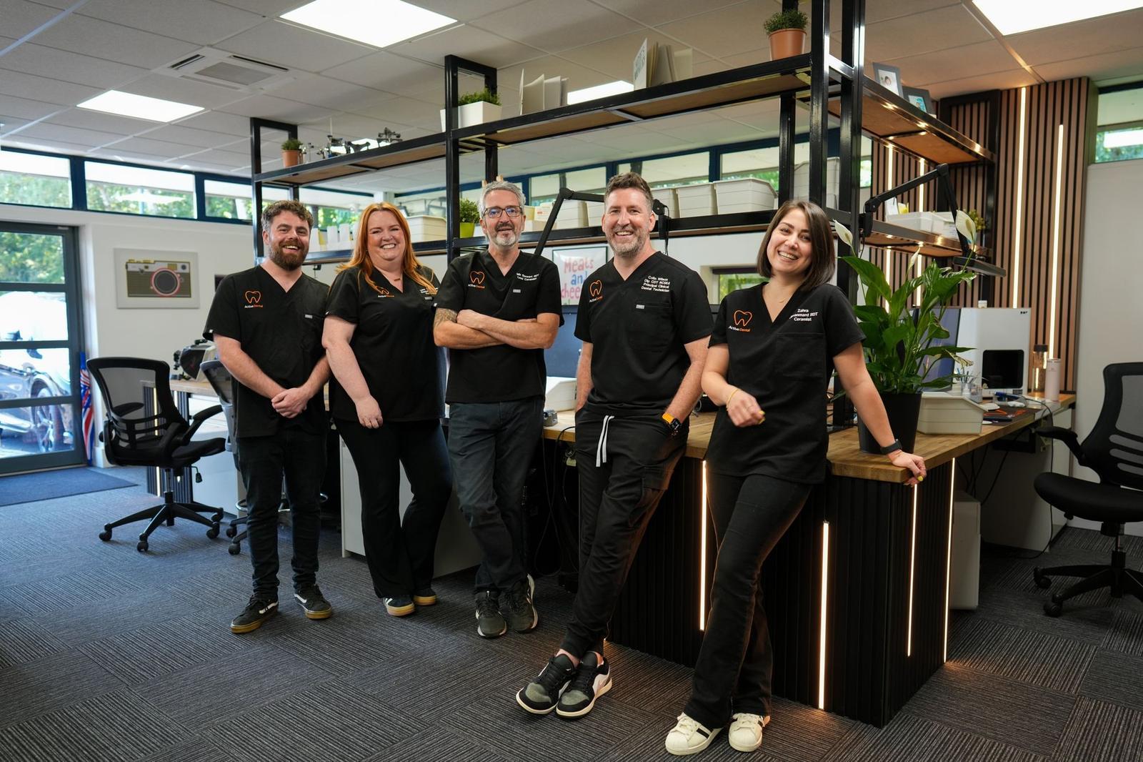 The Active Dental team standing together in the lab